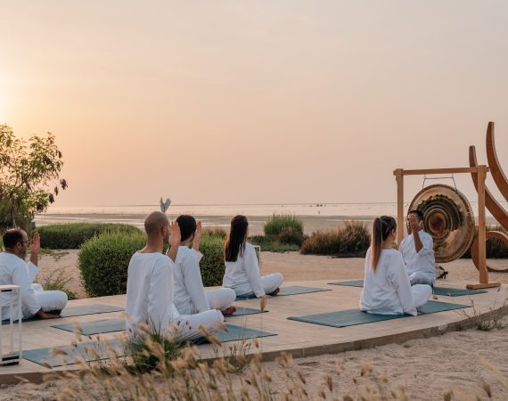 Zulal Wellness Resort by Chiva Som Outdoor Sunset Group Meditation Class