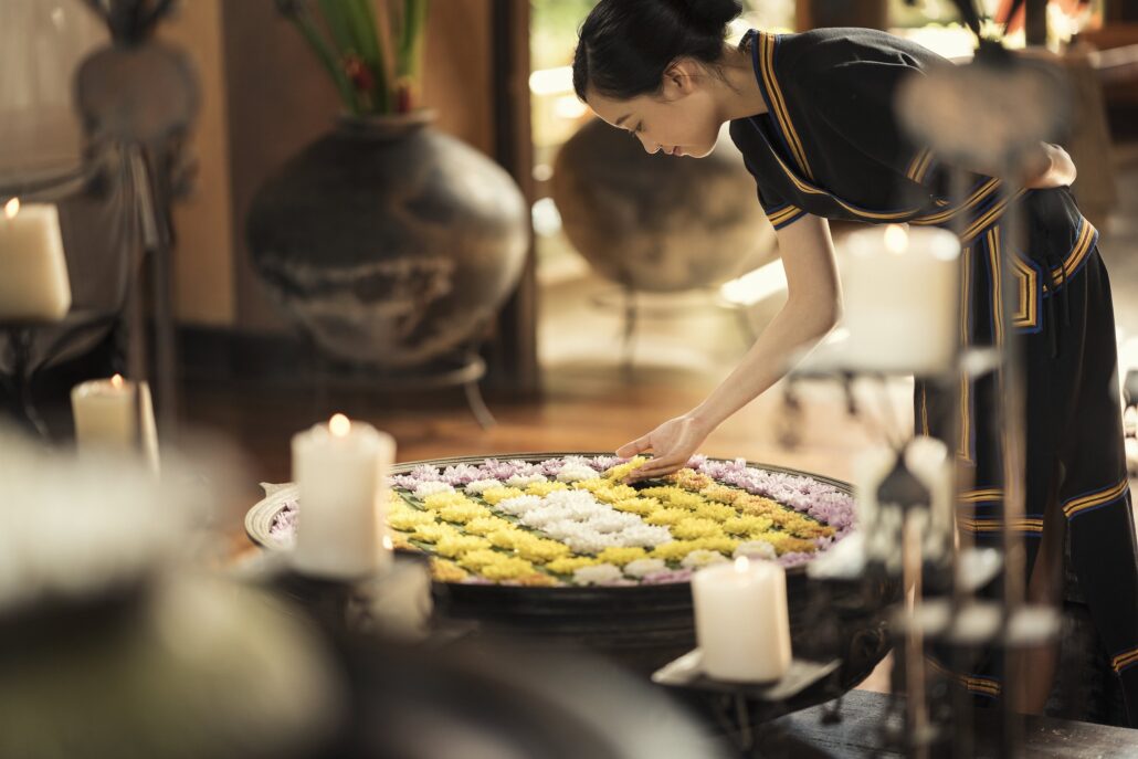Anantara Golden Triangle Elephant Camp And Resort Lobby View Team Member Arranging Flowers 1