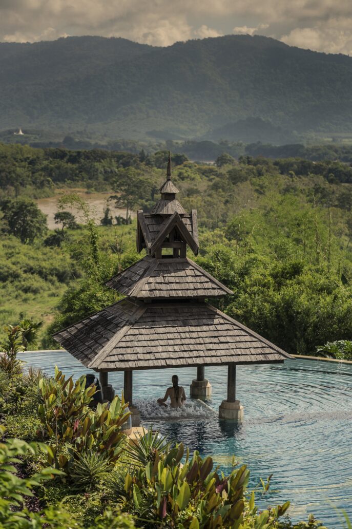 Anantara Golden Triangle Elephant Camp And Resort Pool View Guest Swimming Under Jetbed Sala 1