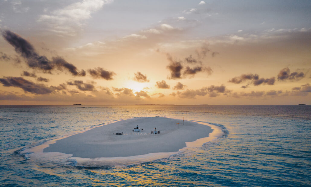 OneOnly Reethi Rah Beach SandBank Dinner Twilight Drone 1